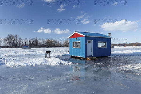 Ice fishing cabin on frozen Saint Lawrence River
