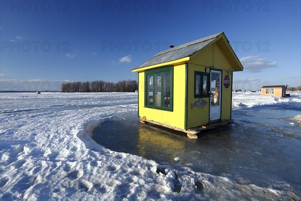 Ice fishing cabin on frozen Saint Lawrence River