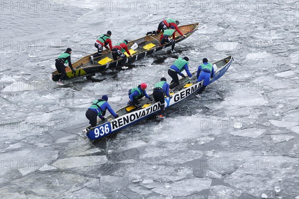 Canoe race challenge over the partly frozen Saint Lawrence River