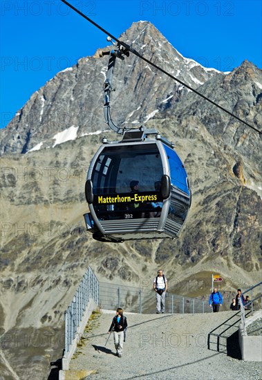 Gondola cable car of the Matterhorn Express at the station Schwarzsee