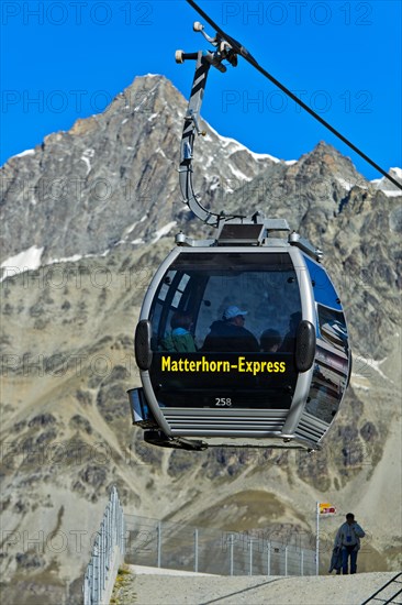 Gondola cable car of the Matterhorn Express at the station Schwarzsee