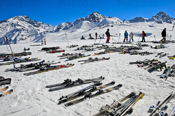 Pairs of skis lying on snow, Les Contamines-Montjoie ski resort