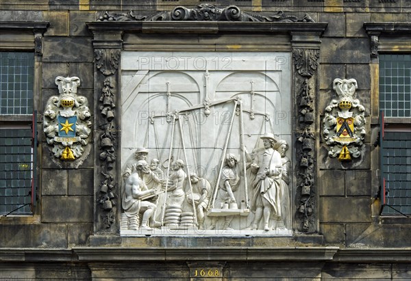 Waaghaus relief depicting weighing of cheese in ancient times