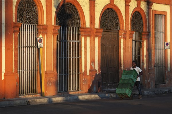 Local man transporting crates