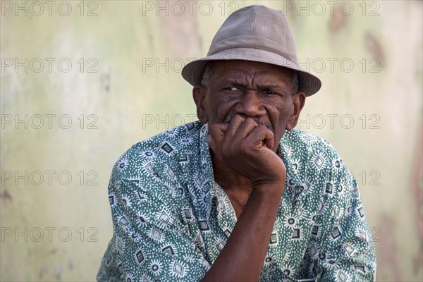 Cuban man wearing a hat