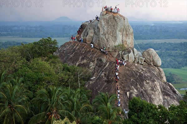 People on Rock of Invitation