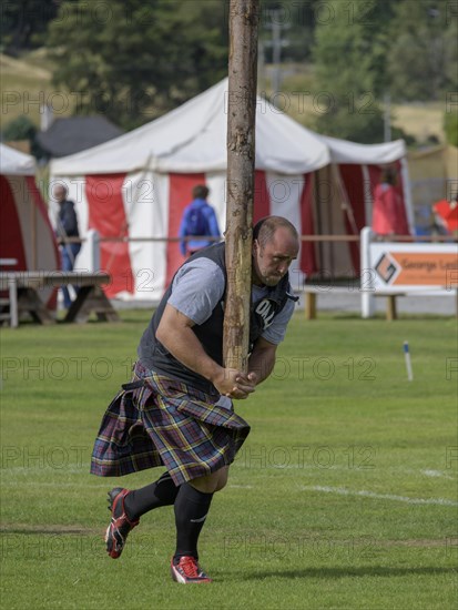 Tossing the caber