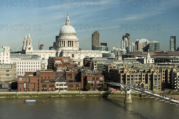 London skyline with St Paul's Cathedral and Millennium Bridge over the River Thames