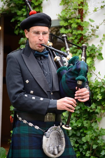 Swedish musician plays bagpipe