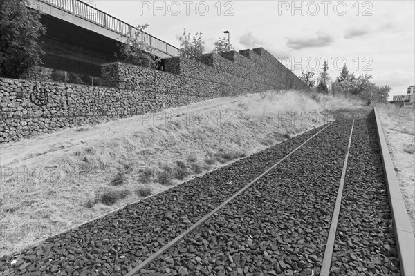 Railway tracks end in emptiness