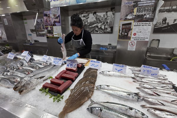 Fish stall saleswoman