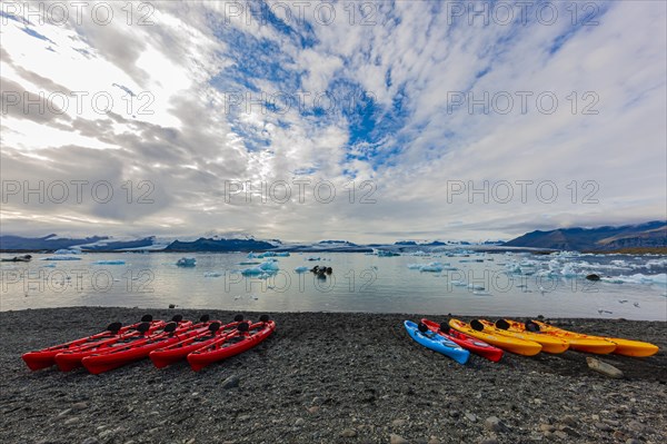 Kayaks on the shore of the glacier lagoon Jokulsarlon