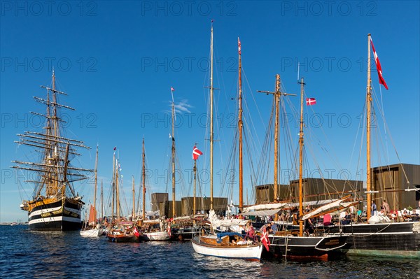 Italian marine training ship Amerigo Vespucci and sailing boats in harbor