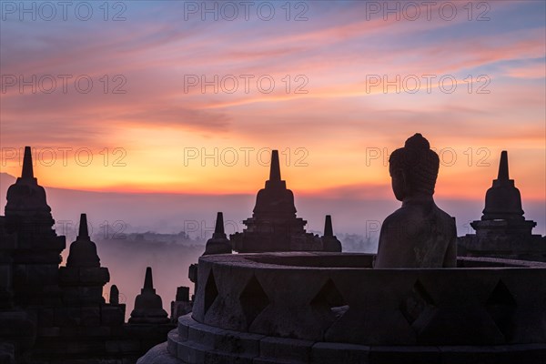 Buddha statue at sunrise