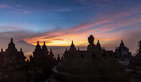 Buddha statue at sunrise