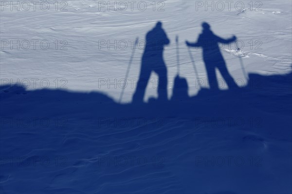 Shadows of two hikers