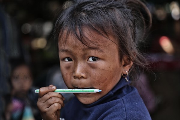 Girl with pen