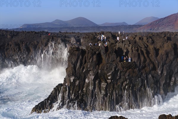 Surf at rocky coast