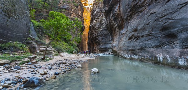 Hikers in river