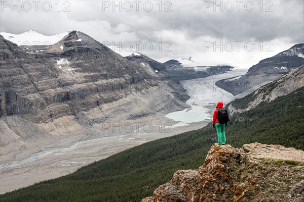 Hiker standing on a rock