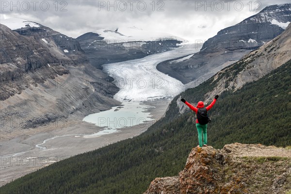 Hiker stands on a rock