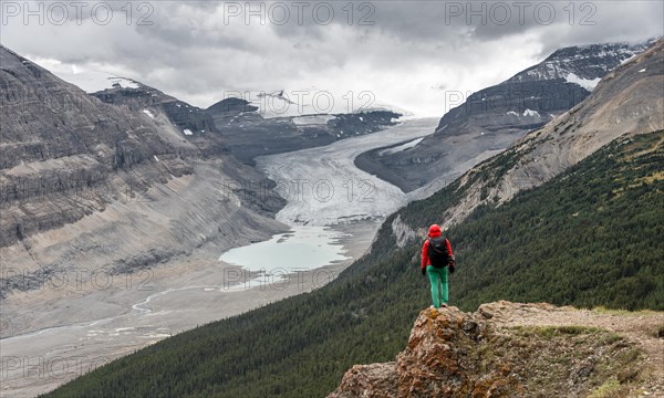 Hiker standing on a rock