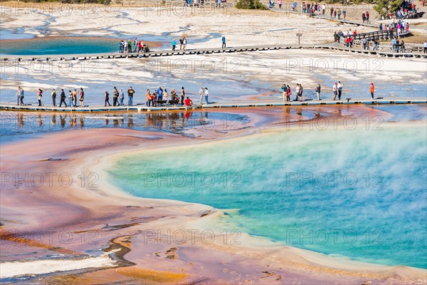 Tourists on a jetty in the thermal area