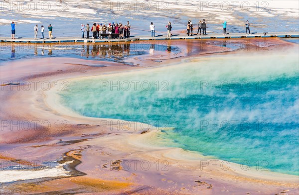 Tourists on a jetty in the thermal area