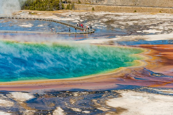 Tourists on a jetty in the thermal area