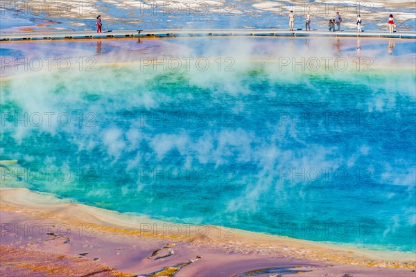 Tourists on a jetty in the thermal area