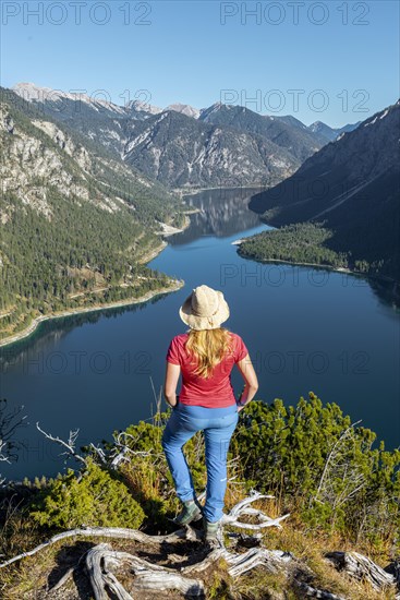 Female hiker looks into the distance
