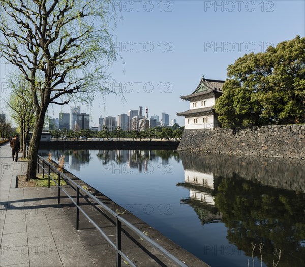 Promenade and watchtower behind castle moat