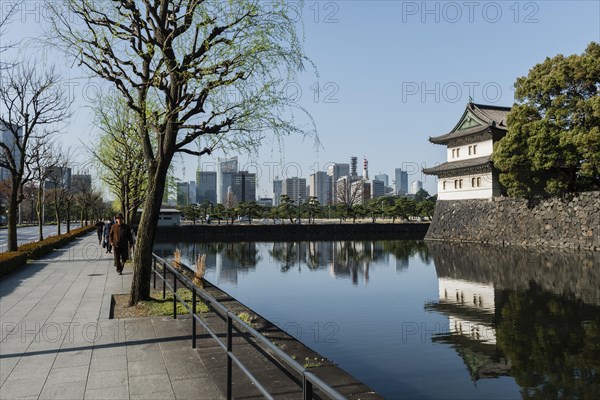 Promenade and watchtower behind castle moat