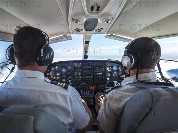 Two pilots in a cockpit