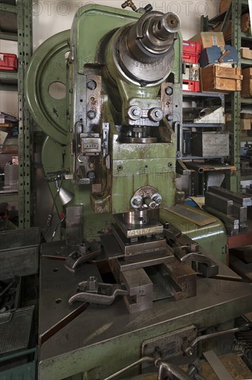 Squeezing machine from the 1950s for the production of tin toys