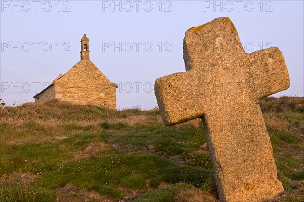 Old stone cross and Chapel of St. Samson in Landunvez