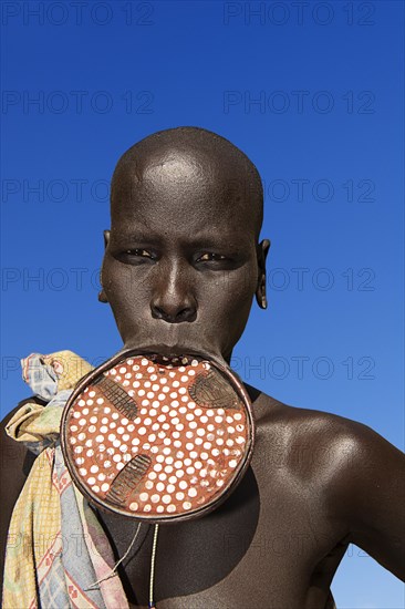 Woman with large lip plate