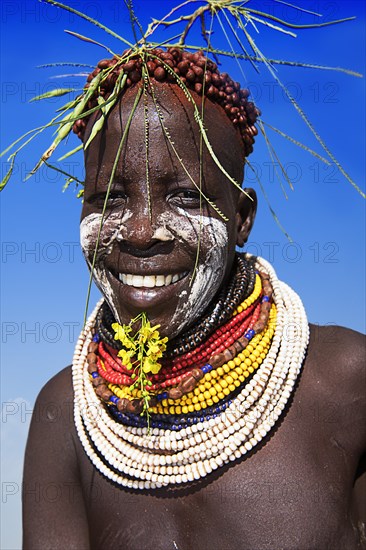 Woman with necklace and headdress