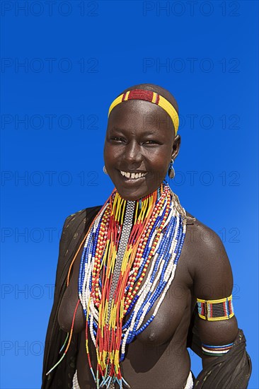 Woman with many pearl necklaces as necklace