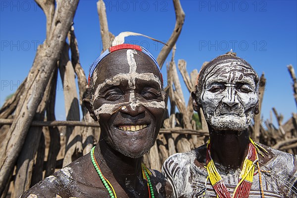 Old men of the tribe of the Karo with face painting