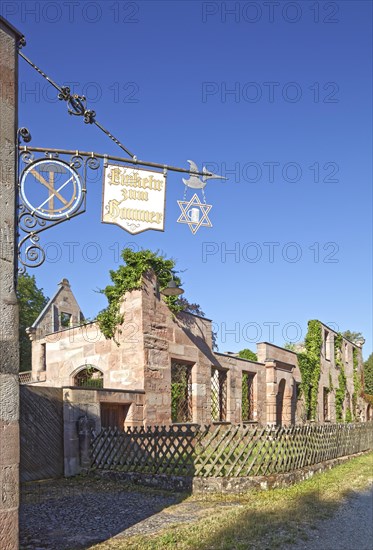 Signboards with inscription Contemplation of Hammer at the inn