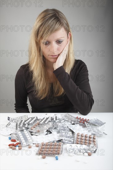 Young woman sitting skeptical