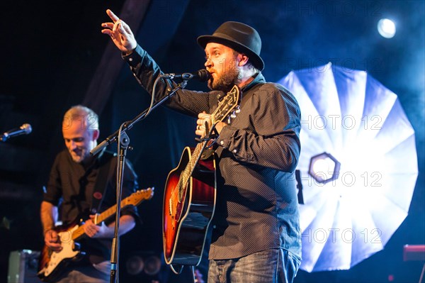 The Swiss singer and songwriter Lukas Linder alias Henrik Belden with band at the record baptism live in the Schuur Lucerne