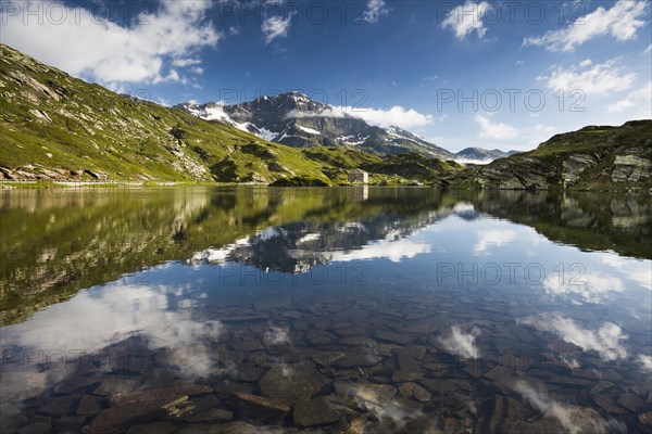 San Bernardino Pass with water reflection