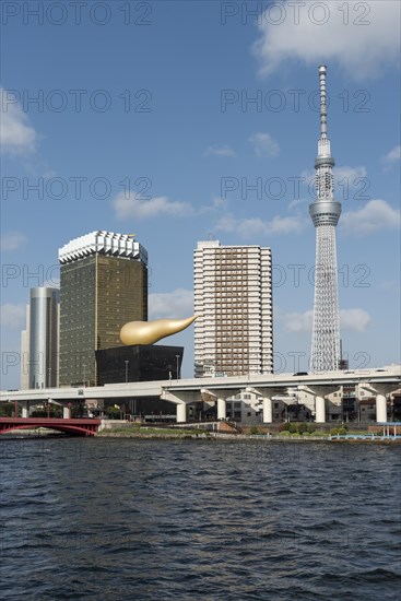 Tokyo Skytree Tower and Asahi headquarters building with Asahi Flame