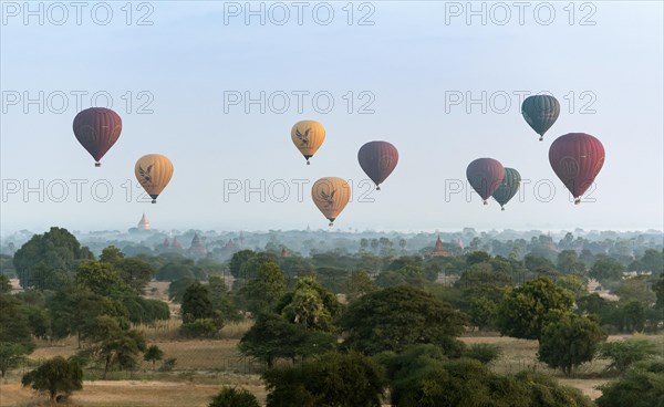 Hot-air Balloons in flight over temples