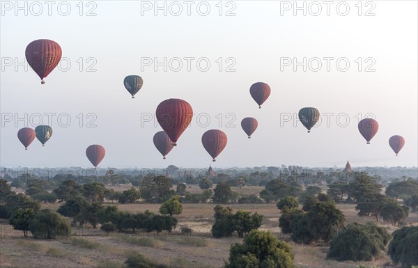 Hot-air Balloons in flight over temples