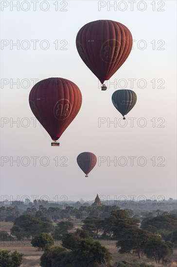 Hot-air Balloons in flight over temples