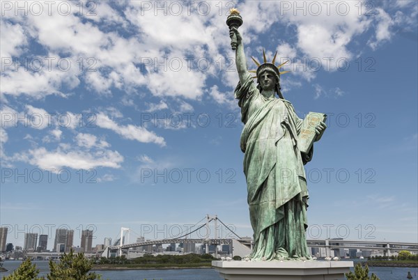 Replica of Statue of Liberty with rainbow Bridge