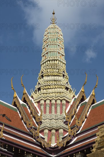 Richly carved Prang of Royal Pantheon at Wat Phra Kaew